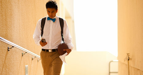 Student walking in hallway - Pepperdine University