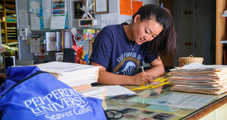 Student working at desk - Pepperdine University