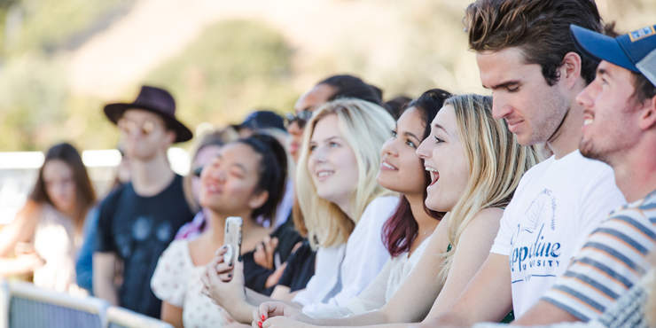 Students are smile at Waves Weekend, Concert in the Park