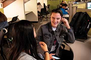 Pepperdine University Seaver College students smiling and studying