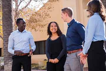 Pepperdine School of Public Policy students posing for photo in quad