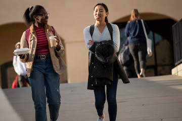 Students with back bags walk - Pepperdine University