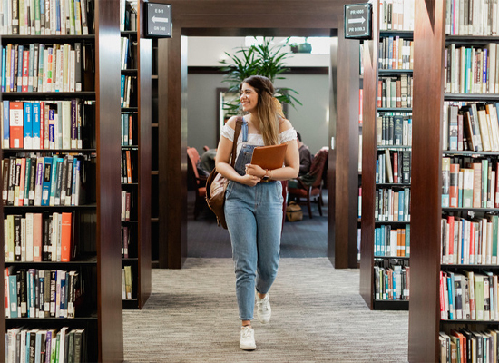 Student in payson library
