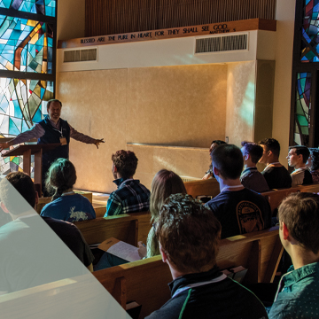 Students sit in Stauffer Chapel for a sermon.