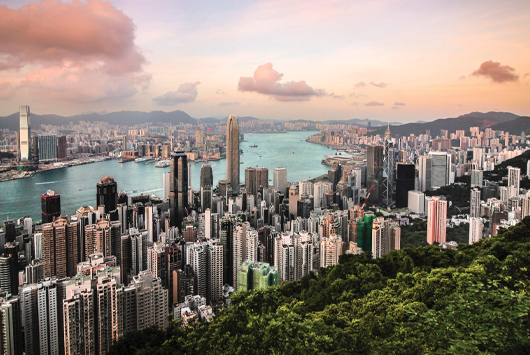 Scenic view of Hong Kong as seen from above at sunset.