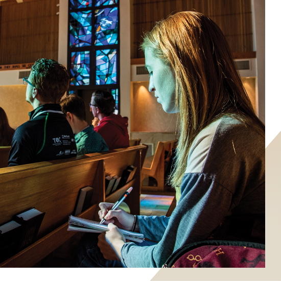 student in the chapel