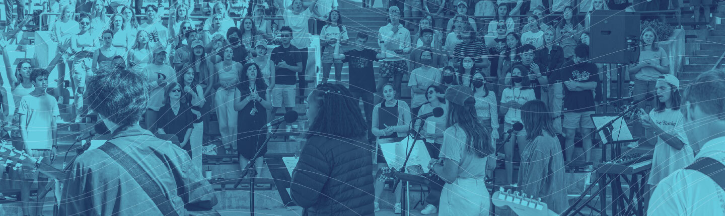 Pepperdine students singing together outside