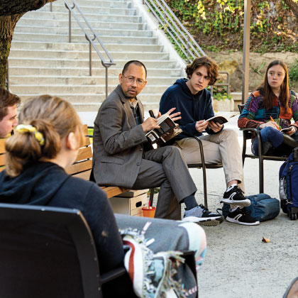 students discussing book