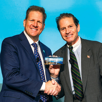 Governor Chris Sununu shaking hands
