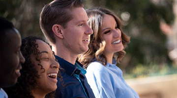 Four Pepperdine students laughing