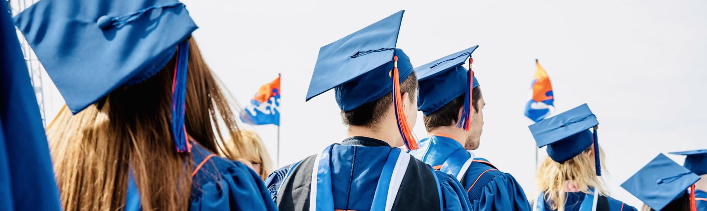 Pepperdine graduates walking in their cap and gown