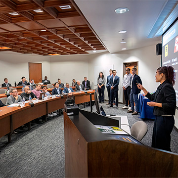 speaker tallking to workshop attendees