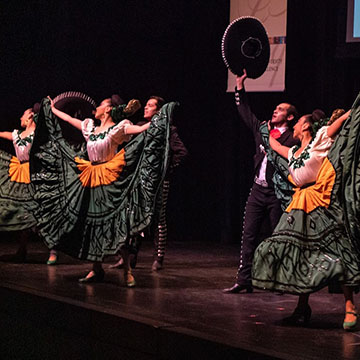 performers on stage in costume