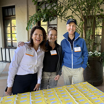 volunteers at a service table