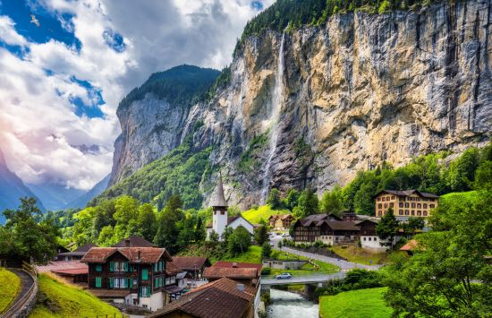 Lauterbrunnen valley with small village and waterfall