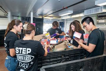 students assembling care packages