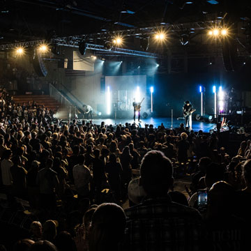 view of stage performers below from upper seats