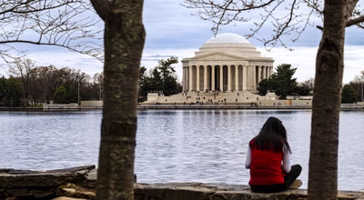 Female looking at the Nation Capital