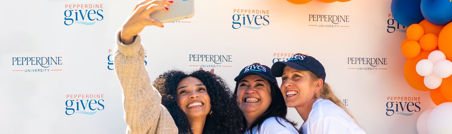 students and faculty celebrating Pepperdine Gives day