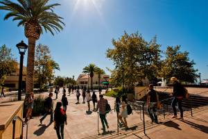 Students walking around Pepperdine's main campus on a sunny day