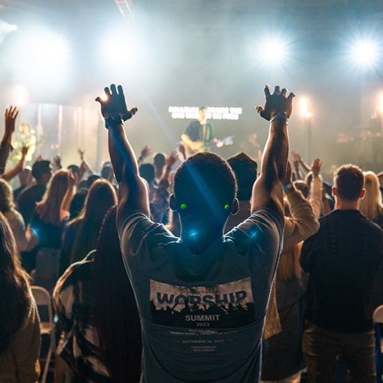 students at a praise worship concert