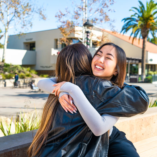 girls hugging