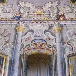 Château d'Hauteville ceiling and doorway with historic, ornate carving and artwork