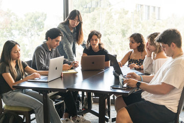 Students working on a group project at Payson