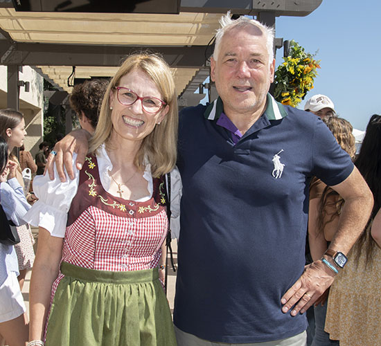 Herr Daughtery and attendee dressed in German attire