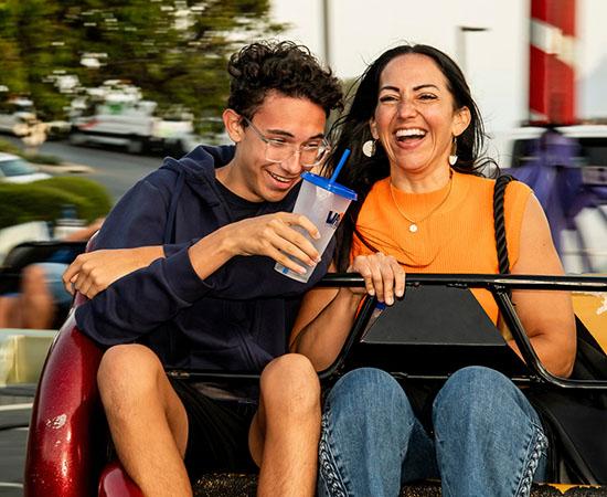two people on an amusement ride