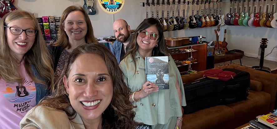 people at the music store with instruments