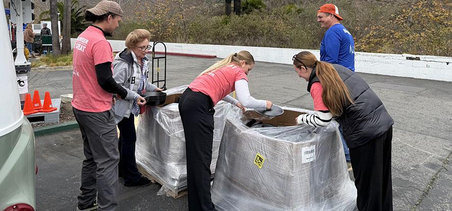 people providing relief assistance at a disaster recovery center