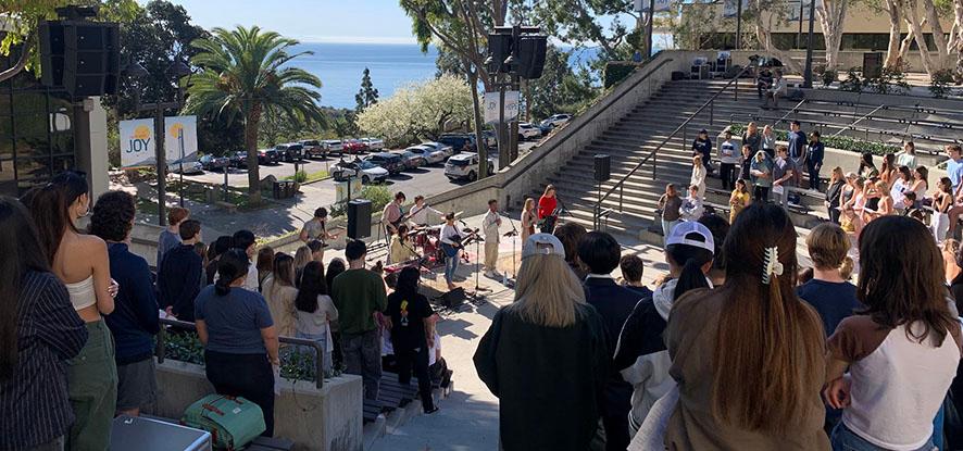 people gathered at The Well on campus for worship