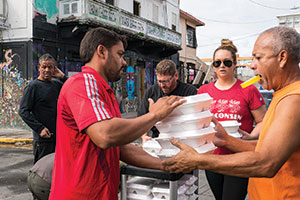 People handing out food in Puerto Rico