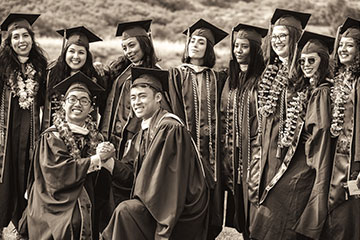 GSEP students grouped together at graduation for a photo