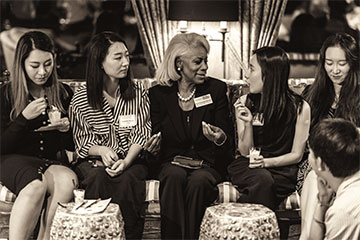 Dean Helen Easterling Williams meets with students at the annual international student reception hosted by the Office of International Student Services.