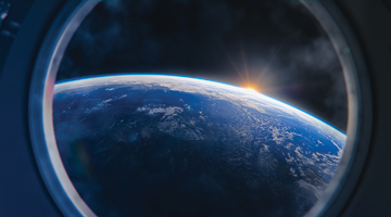 view of earth through a porthole