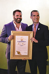 Jason Nazar (left) and mayor Eric Garrett (right)