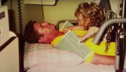 Sam Schmidt in the hospital with his daughter following his accident in 2000
