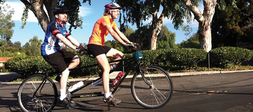 Christine Tinberg on bicycle - Pepperdine Magazine