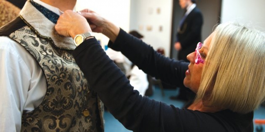 Pepperdine Fine Arts production costume fitting - Pepperdine Magazine