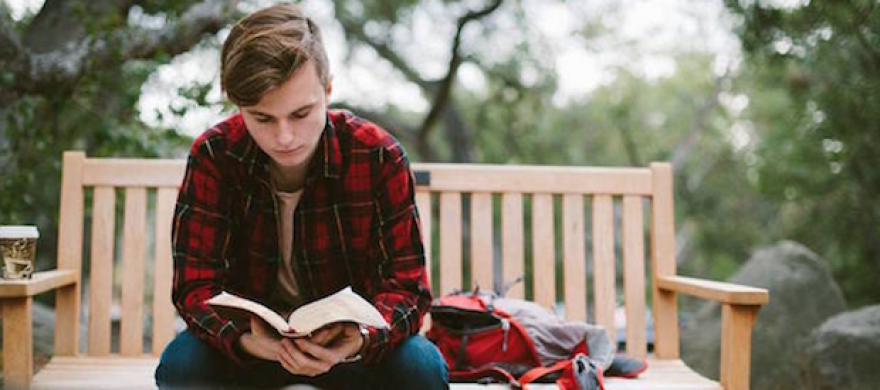 Student reading the Bible - Pepperdine Magazine