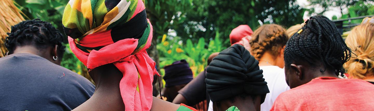 people huddled in Uganda