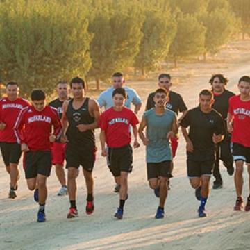 Students running - Pepperdine Magazine