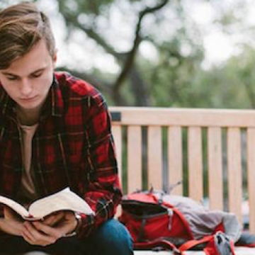 Student reading the Bible - Pepperdine Magazine