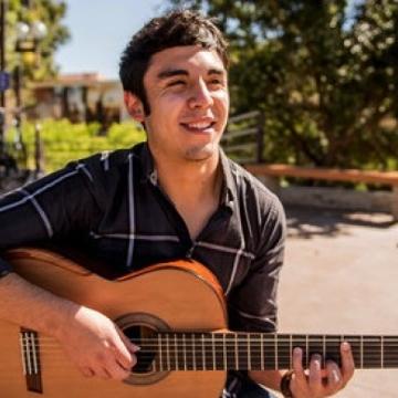 Seaver College student plays guitar - Pepperdine Magazine