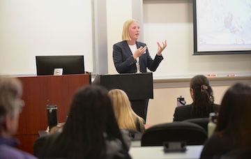 A student presenting research