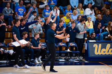 Coach Winder celebrating with his team