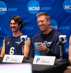 Winder and his athletes amid a press conference
