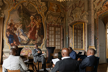 Participants gathered in breakout groups